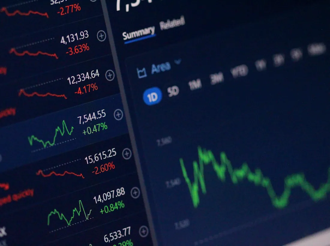 A dark analytics dashboard showing live metrics and trend lines